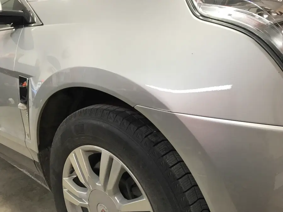 Après - Débosselage sans peinture sur une Cadillac